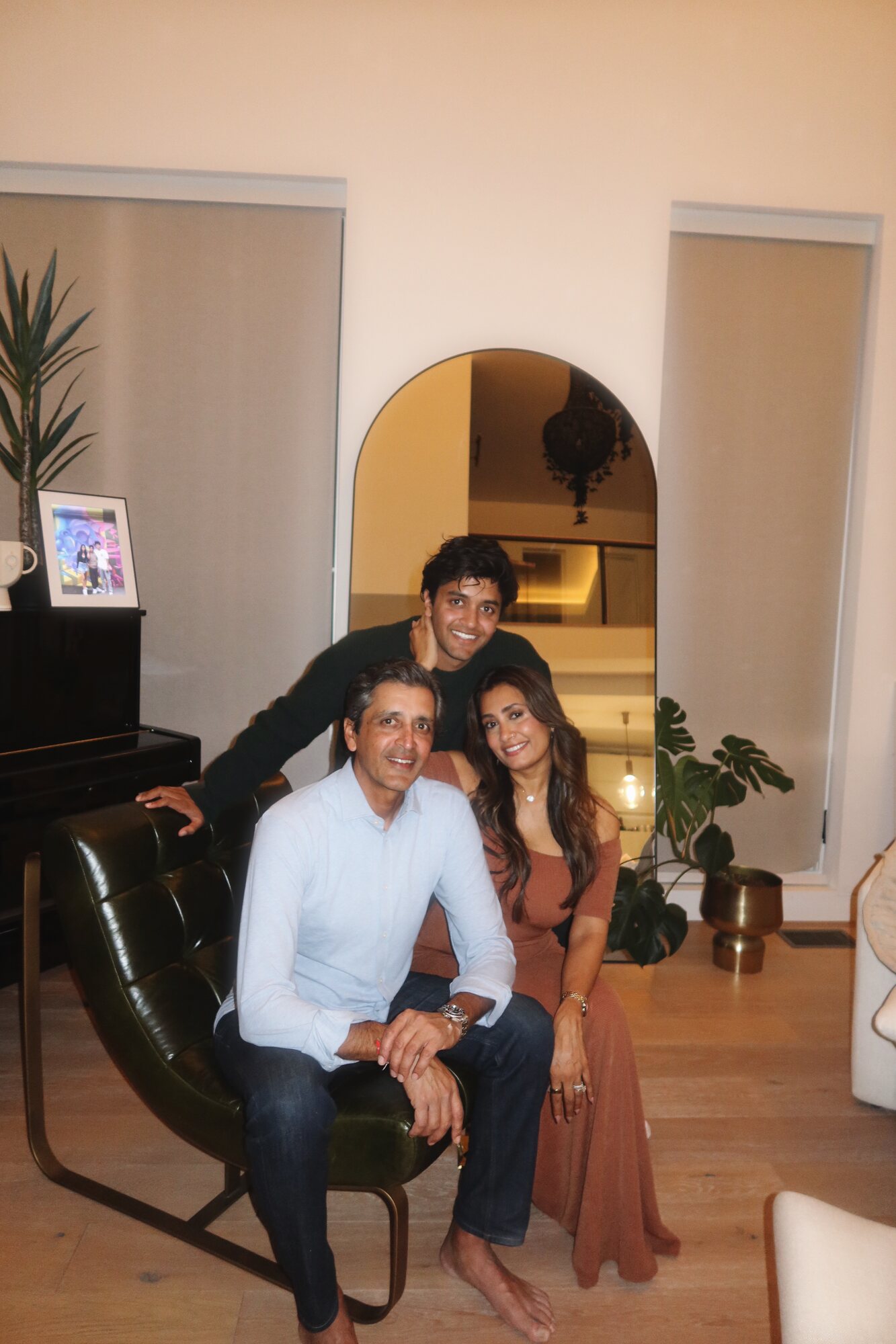 Kyan Patel at home with his mother and father